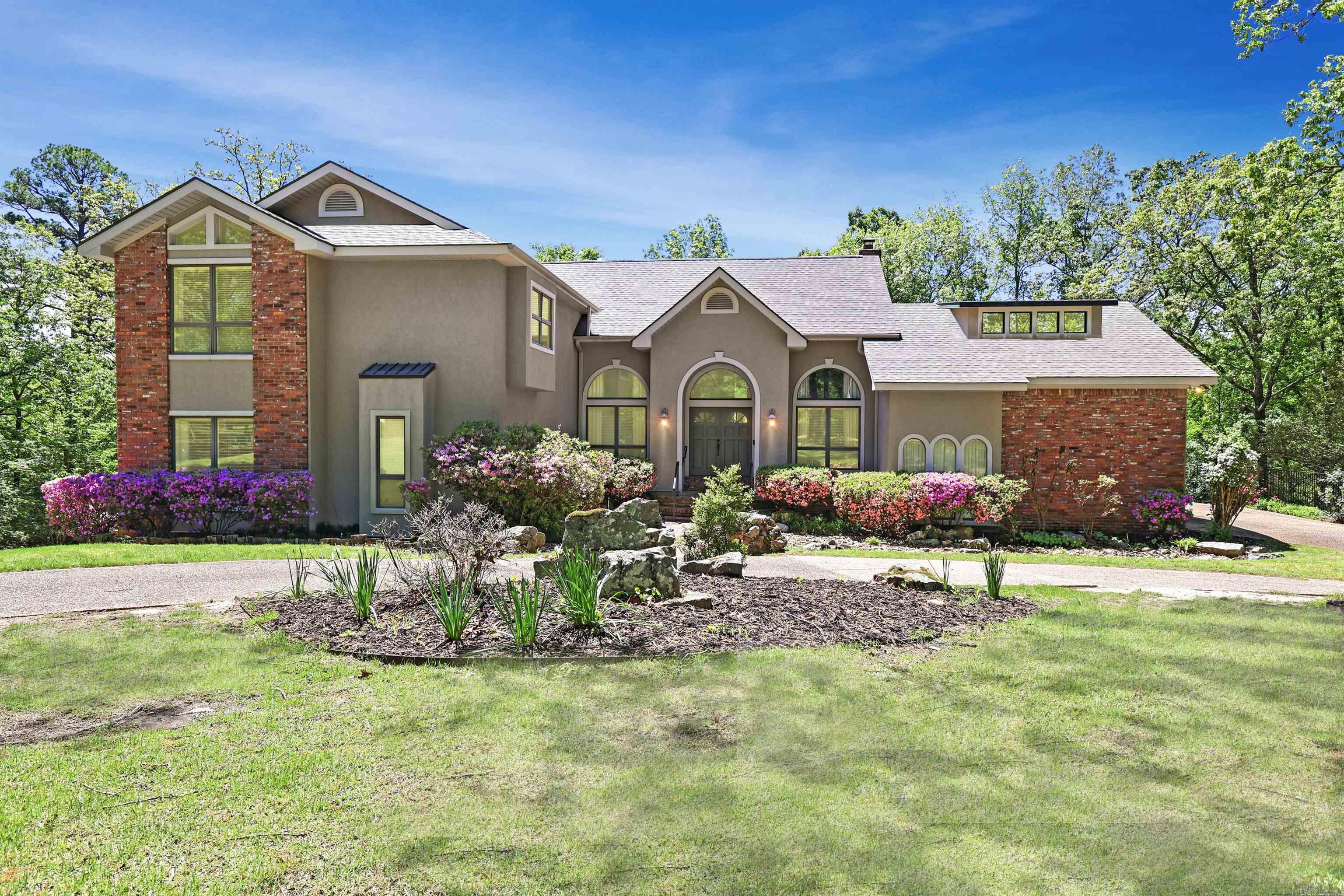 Welcome to your dream home nestled on 1.37 acres in prestigious Eastgate II, located in Lakeside School District. This updated custom home has been well maintained and offers the perfect blend of functionality and style. Step inside and be greeted by beautiful wood floors that pave your way through high-ceiling, light-bathed rooms and 2 fireplaces that set the stage for many memorable family gatherings. The gourmet kitchen is equipped with a gas cooktop on a large island, wine cooler, pantry, and abundant cabinetry. Adjacent the kitchen is a sunroom that offers a peaceful retreat for your morning routines. The primary suite is located on the main level and features 2 closets, heated floors, and a body jet shower. Upstairs are 3 additional bedrooms and 2 bathrooms providing ample space for family and guests. Outside boasts a newer pool and pergola with a hot tub, tiered decks and patios with a SunSetter motorized awning over the deck, circle driveway, 3-car garage, new roof in 2020, newer HVAC, and a whole house generator. Don't forget the extra storage below the sunroom and the fenced backyard ensuring privacy and security.