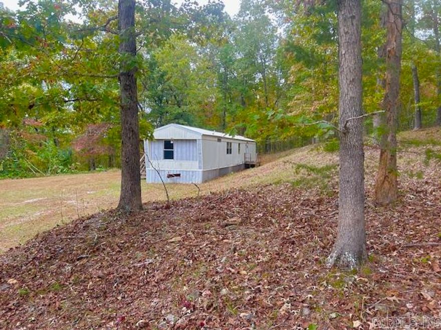 Newley renovated 2BR/2BA home on 4.5 peaceful acres just past Pine Hills Golf Course and minutes from downtown Mountain View—the Folk Music Capital of the World! Nearly move-in ready, this property includes two additional home pads with power, water, and septic—ideal for extra homes, rentals, or RV spots for friends and family. With three parcels and three addresses, the possibilities are endless! Enjoy privacy down a wooded driveway surrounded by deer and wildlife, all just minutes from the famous White River. Perfect for a full-time residence, getaway, or investment opportunity! Pictures of inside home will be added shortly. It is still being worked on. Call today to see it for yourself.