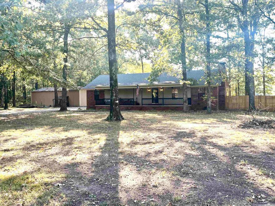 Enjoy peaceful country living with the convenience of city amenities! This charming single-family home is located in the South Bend community just outside of Jacksonville. Sitting on 1.16 acres, this property offers 1,814 square feet of comfortable living space, featuring 3 spacious bedrooms and 2 full baths and also includes a 30'x50' workshop-a dream space for hobbyists, small business owners, or anyone needing extra storage. Step inside to a sunken living room with a cozy fireplace and wood stove insert. The large kitchen is ideal for cooking and entertaining, featuring oak cabinets, a kitchen island, and plenty of counter space. A separate laundry room adds extra convenience to your daily routine. Outside, you’ll fall in love with the large, mature oak trees that give the property its welcoming, country feel. Relax on the large front porch with your morning coffee, or enjoy the back deck inside a fenced backyard. Schedule your showing today!