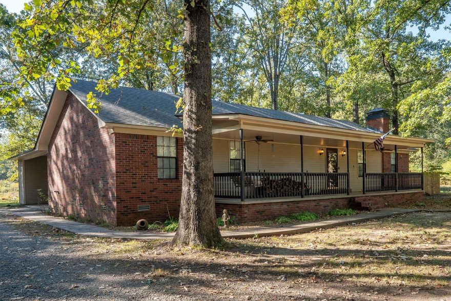 Enjoy peaceful country living with the convenience of city amenities! This charming single-family home is located in the South Bend community between Furlow and Jacksonville. Sitting on 1.16 acres, this property offers 1,814 square feet of comfortable living space, featuring 3 spacious bedrooms and 2 full baths and also includes a 30'x50' workshop-a dream space for hobbyists, small business owners, or anyone needing extra storage. Step inside to a sunken living room with a cozy fireplace and wood stove insert. The large kitchen is ideal for cooking and entertaining, featuring oak cabinets, a kitchen island, and plenty of counter space. A separate laundry room adds extra convenience to your daily routine. Outside, you’ll fall in love with the large, mature oak trees that give the property its welcoming, country feel. Relax on the large front porch with your morning coffee, or enjoy the back deck inside a fenced backyard. Schedule your showing today!