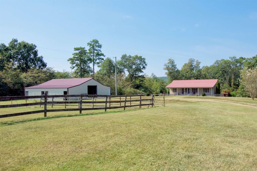 If you are looking for a rustic and charming rural setting, this property may be the perfect fit for you. This property boasts three bedrooms and two bathrooms, along with over four acres of fenced and cross fenced land. You'll love the gorgeous views from the large back deck, which is perfect for outdoor entertaining or just enjoying the scenery with your morning coffee. But that's not all - this property also includes a 2160 square foot barn with stalls, electric, and a water spigot. This barn is ideal for livestock, storage, or even a workshop. And if you love the great outdoors, you'll appreciate being close to Greers Ferry Lake, which offers plenty of opportunities for boating, fishing, and swimming. Whether you're looking for a peaceful retreat or a place to call home, this property has everything you need to enjoy the beauty of rural living. So why wait? Come see it for yourself today! Check out the 3D tour and aerial drone footage in the links.