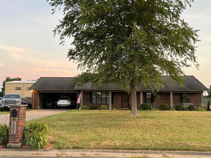 Location, Location, Location.  Yet never have to leave home.  One non smoking owner.  2 lots with a pool, wood burning fireplace, 20x24 shop with roll up door, privacy fence , just to name a few.  New roof in 2023, floored attice space, 2 car garage.  all electric.  What more do you need?   Make it yours today