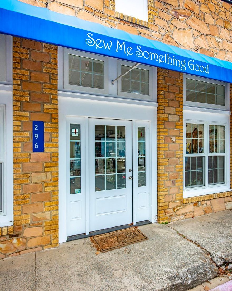 Move-in–ready commercial space in the heart of charming downtown Clinton! Located just off the historic court square, this beautifully updated 960 sq. ft. building offers exceptional visibility and versatility for your next business venture. Nearly every inch has been renovated, including new windows, doors, awning, LVT flooring, granite countertops, fresh paint, water heater, and heat/air, while still showcasing its character with a repurposed original tin ceiling. A half bath adds convenience and the roof was replaced in late 2023 with  thermoplastic polyolefin that includes a 20-year transferable warranty.  Whether you're envisioning a boutique, retail shop, professional office, or a creative workspace, this property delivers the perfect blend of charm, modern updates, and prime downtown location. Endless potential and ready for its next owner! Please see agent remarks.