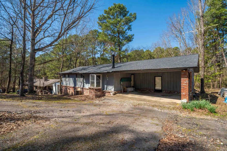 A Cozy Retreat with Scenic Views and Rustic Charm! This charming property boasts 120 feet of pristine lake frontage, with boat dock. The cottage has 2 bedrooms , 2 full baths, open living - dining, full kitchen with  breakfast bar. Sitting on  half-acre lot, offering plenty of space for outdoor activities, gardening, or simply exploring the natural surroundings. Agents please see remarks.