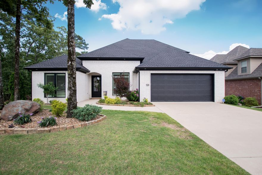 Fall in love with this custom-built home!  Majestic in every way with high end finishes throughout including Plantation Shutters, Remote Shades, Matted Gold Fixtures and Lighting plus so much more!  Formal Dining, Open Living/kitchen/dining area!  Kitchen features quartz countertops, breakfast bar, stainless steel appliances, an amazing walk-in pantry that serves as a coffee bar area as well.  Beautiful hardwood flooring throughout the home with tile in the bathrooms.  4th Bedroom serves as a Bonus with a full bath!  Spacious Guest Bedrooms!  Tons of storage!  Attic Lift! Storm Shelter in Garage!  Nice, covered patio with fireplace and extended deck great for relaxing and/or entertaining.  Private backyard with extra landscaping both front and back.  Sprinkler System! Don't miss this wonderful home with so many special features!