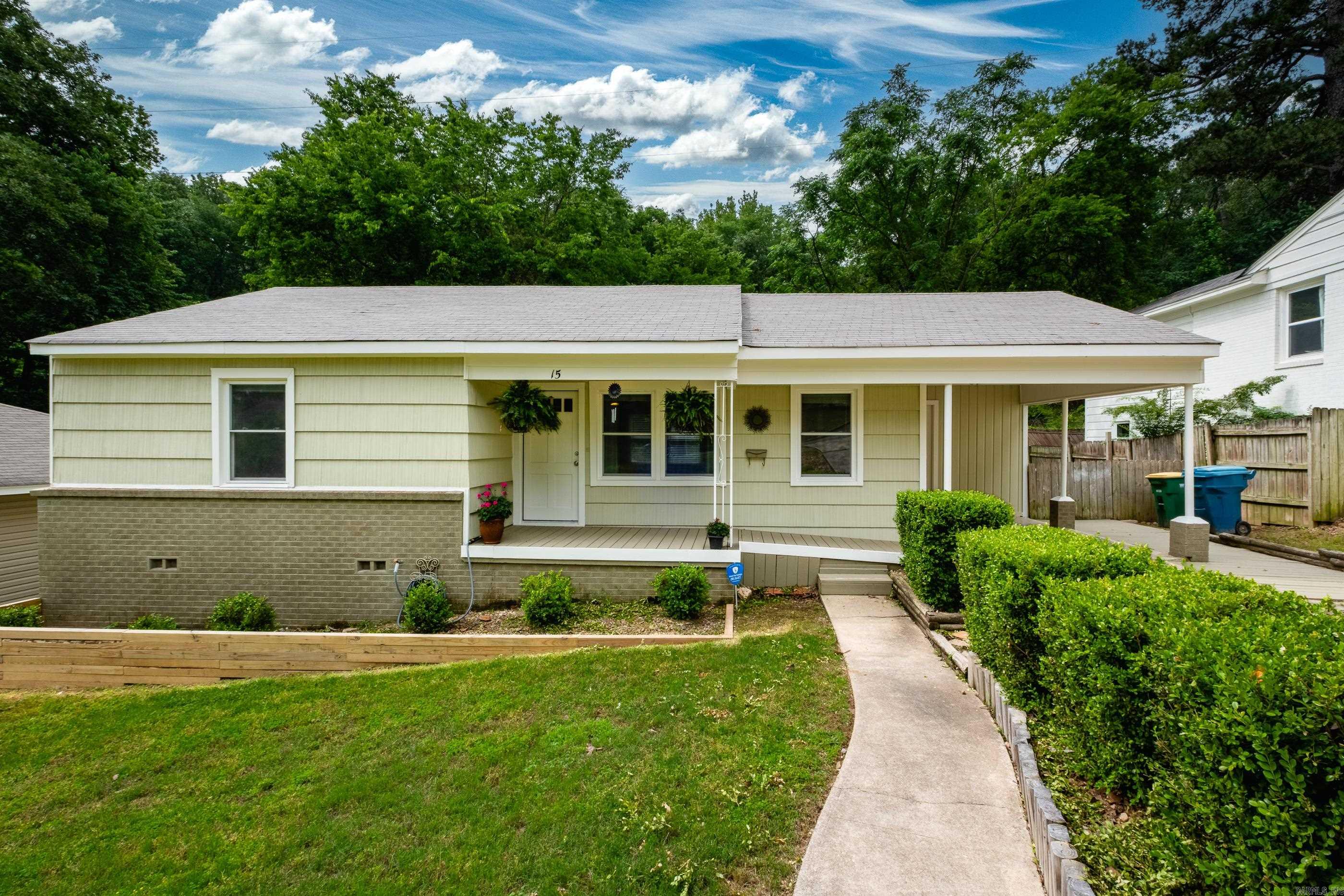 Move in ready home in quiet neighborhood. This 2 bedroom, 1 & 1/2 bath home has beautiful hardwoods, a large laundry area, separate dining, and a great backyard plus a BRAND NEW ROOF! Perfect starter home or investment property. Zoned for Pulaski Heights Elementary. All appliances and home warranty convey!