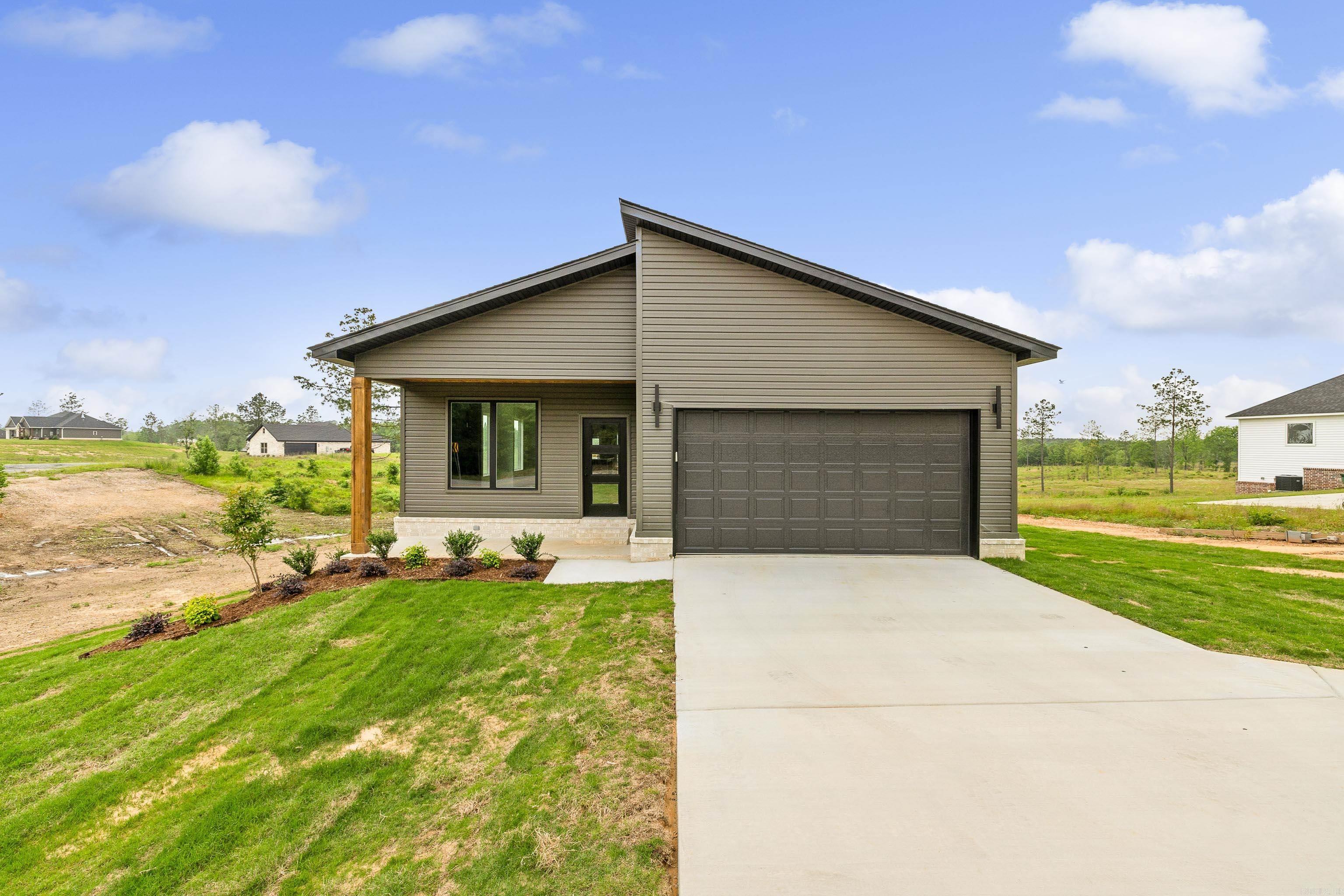 Beautiful new construction home with lots of space and plenty of room on 1.87 acres. This home is a must see with lots of custom features. Open kitchen with large island, custom cabinets, electric fireplace, large walk in pantry, large primary suite and walk in closet & bath. The backyard is beautiful and has lots of space with a deck overlooking it all.