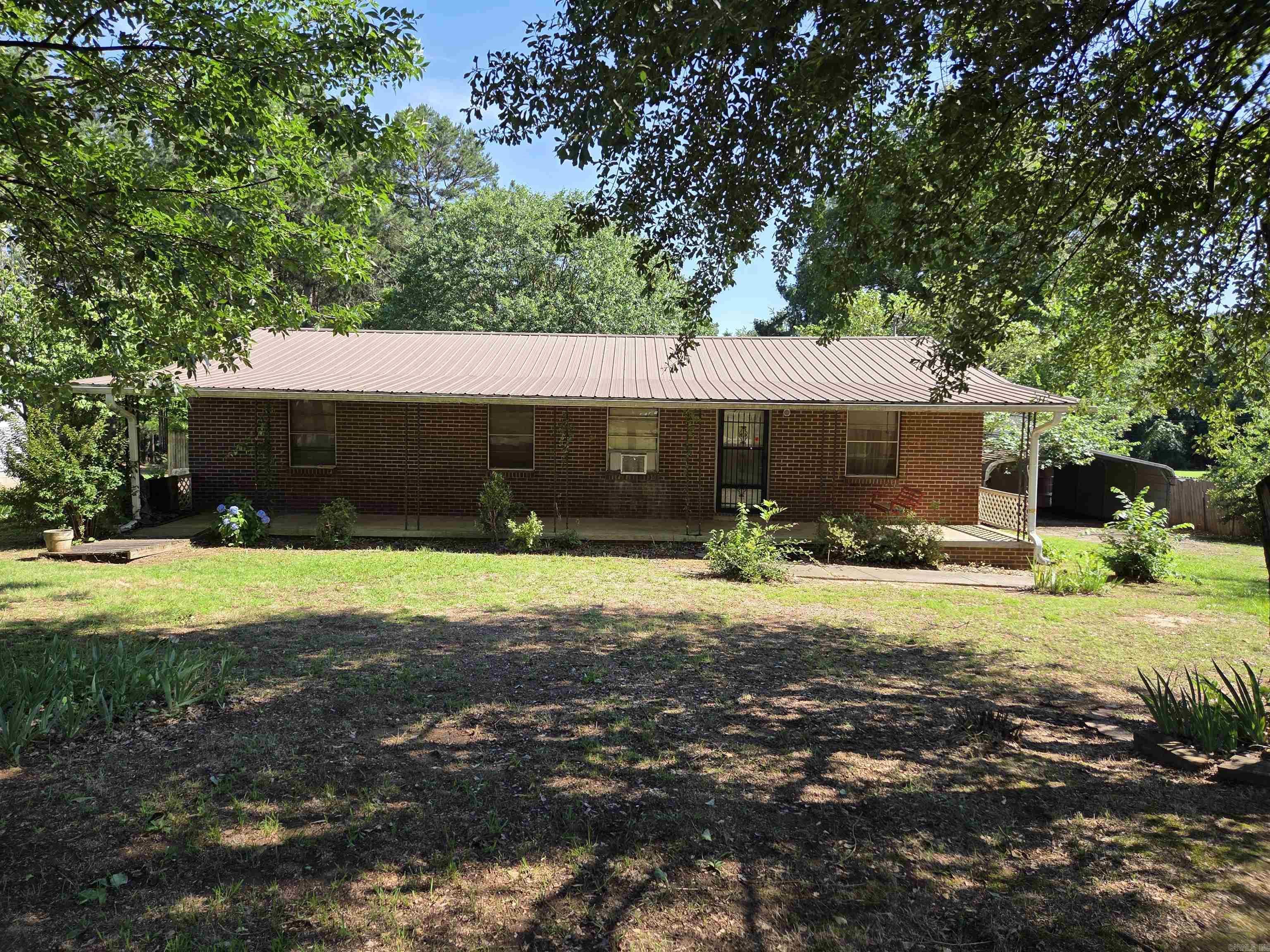 Spacious brick home in the heart of Lamar with exceptional features you wonāt find everywhere! This property sits on a beautifully landscaped lot and includes a storm shelter for peace of mind. Inside, the large, open layout offers plenty of room for family living or entertaining, with a recently remodeled bathroom adding a modern touch. Multiple outbuildings provide endless possibilities, including a massive storage room with electricity that was once used as a shop/garage sale buildingāperfect for hobbies, a home business, or extra storage. While the home is move-in ready, it could use a little TLC, mainly fresh paint and trim, giving you the opportunity to make it your own. Priced to sell and conveniently located near schools, downtown Clarksville, and I-40, this property combines space, functionality, and value in one package!