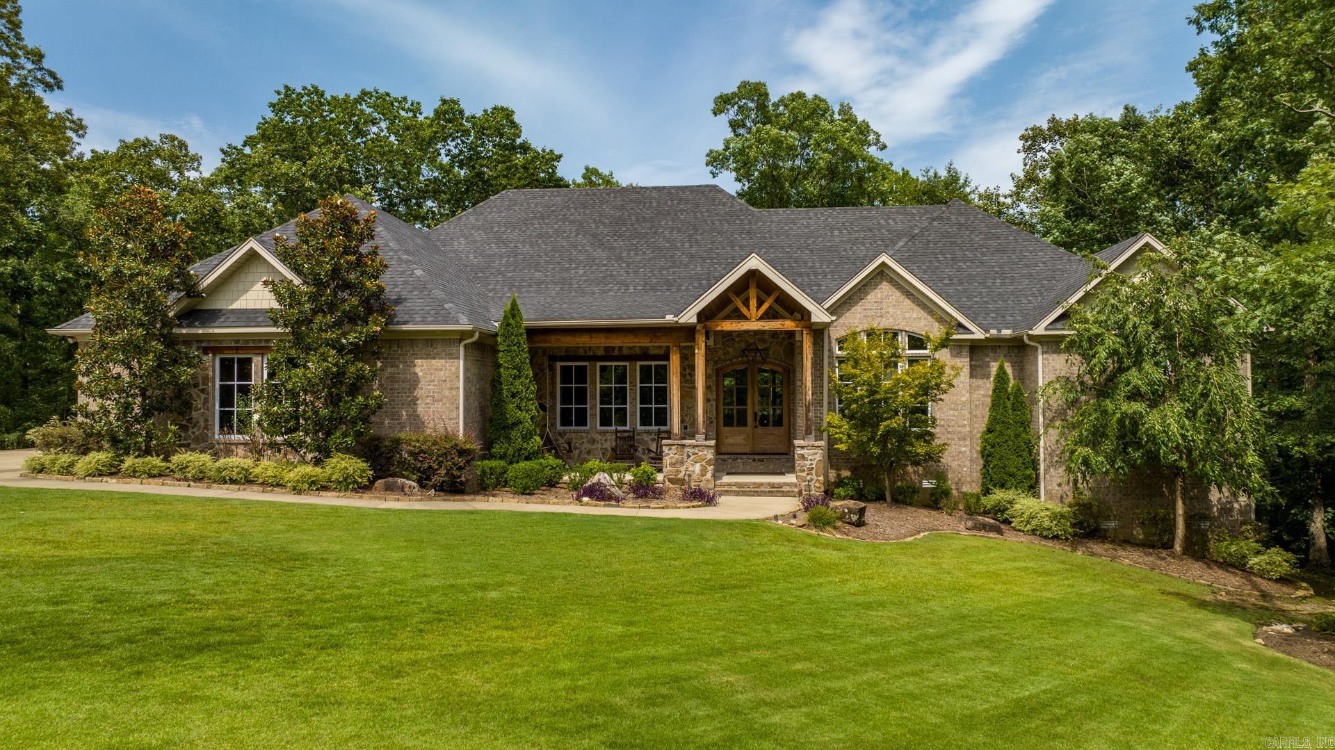 Outstanding home on fantastic culdesac in the pristine area of The Preserves in Woodlandās Edge. Predominately a one level home with beautiful finishes & tons of natural light. Open living space with fireplace & vaulted, beamed ceiling, & tons of windows, all open to the kitchen & breakfast space. Family sized kitchen includes a gas range, oversized fridge/freezer combo & huge island with storage & seating. The primary bedroom is on the main level with access to the covered back patio. Large primary bathroom with double vanity, soaking tub & large shower. Huge walk in closet with 2nd W/D hookup. Formal dining area as well. There is a fantastic office with shelving & 2 built in desks. 2 other bedrooms, both ensuite, as well as a playroom area make up the rest of the bedroom space on main level (private side entry so could be separate quarters). Home also has large family sized laundry, wine room, half bath and a 3 car garage! Fourth bedroom with a full bath attached. Upstairs is a fun media /bunkroom with 2 sets of bunkbeds!! (5th bed) Walk out storage. Fenced backyard overlooking green space on this .60 acre beautiful lot. Oversized back covered porch. A wonderful home!!!