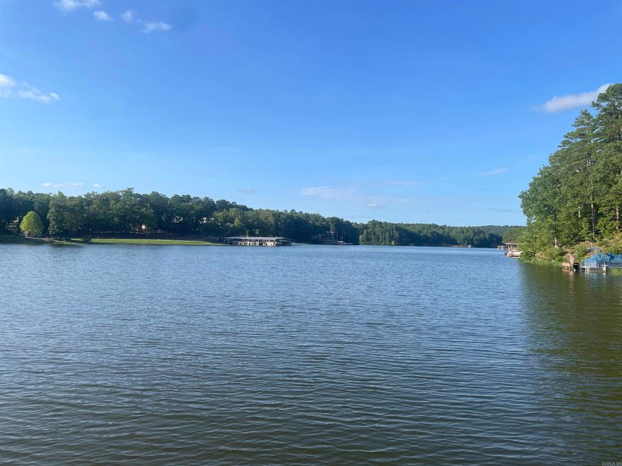 Discover Your Dream Lot at Coronado Lake!  Imagine waking up each morning to the tranquil sounds of nature and the gentle lapping of water against the shore. Nestled in the stunning expanse of Hot Springs Village, this Coronado lakefront lot offers you this serene escape and so much more. With breathtaking panoramic views of shimmering waters and lush, rolling landscapes, this prime piece of real estate is your gateway to a life of leisure and luxury. Whatever you're envisioning, the possibilities are as endless as the beauty that surrounds you. Enjoy access to recreational activities including boating, fishing, and scenic hikes, all while benefiting from the vibrant community amenities of Hot Springs Village. Seize the opportunity to own a slice of paradise where every sunset is a masterpiece and every moment is a cherished memory. Your lakeside sanctuary awaits—turn your dream into a reality today.