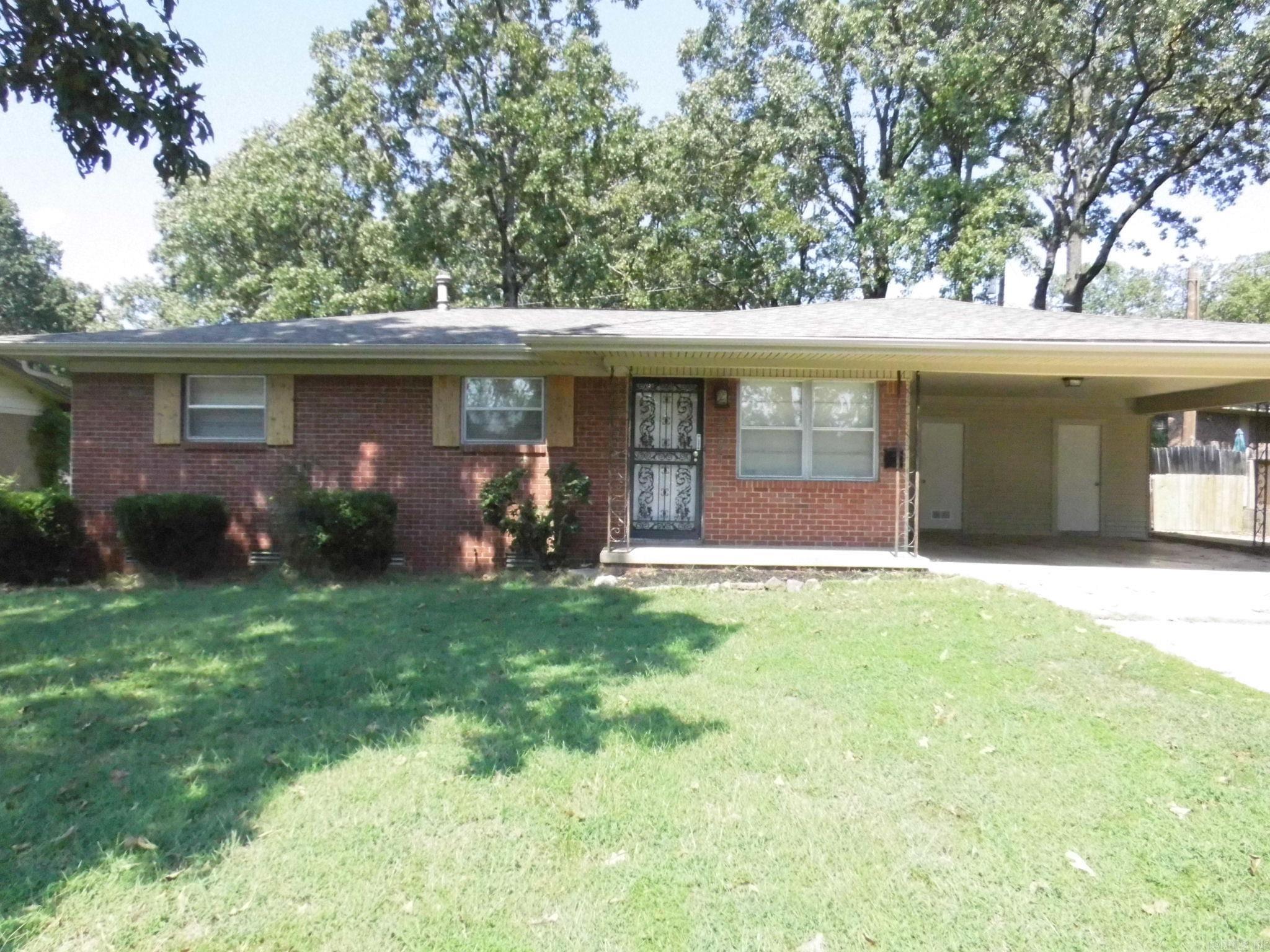 **Great neighborhood of well maintained homes**Brick home with 2 car carport** Wood deck overlooks fenced backyard**Interior features some updating to kitchen and bathroom along with flooring in den area**Original hardwood floors in living room, hallway, and bedrooms**A little TLC and this will make a fantastic starter home**2 living areas**Den features a WBFP insert**Schedule a tour of this home today**