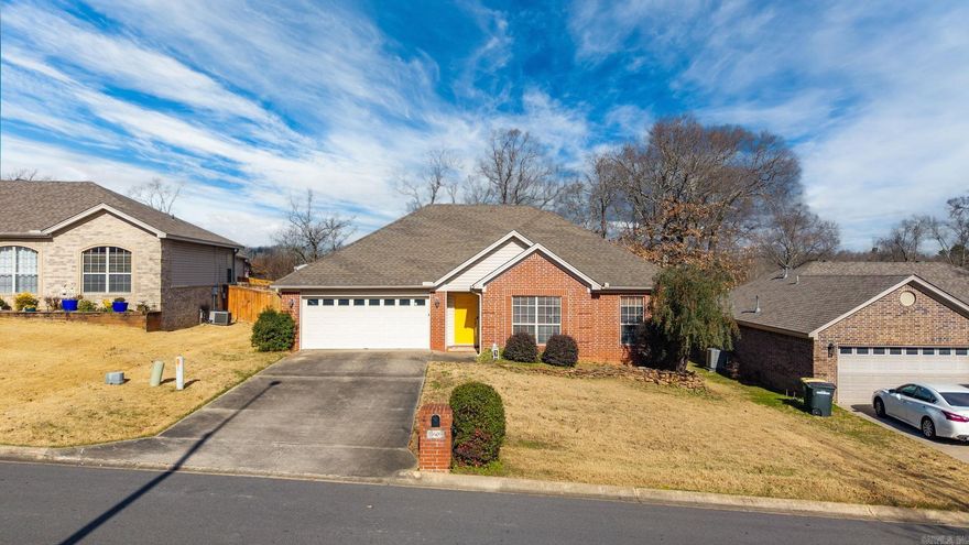 Centrally located in Sherwood in Woodruff Creek Addition.  One level with 3 bedrooms and 2 full bathrooms.  Spacious den with hardwood floors, trey ceiling and gas log fireplace that opens into kitchen.  The kitchen is equipped with smooth top stove, microwave, and dishwasher and an eat-in area. Laundry off the kitchen.  Primary bedroom has a ensuite bathroom with 2 sinks, 2 closets, separate shower and whirlpool tub.  The backyard is spacious, fenced and has a patio with a built-in bench and grill.  Newer carpet in the bedrooms. See agent remarks for showing.