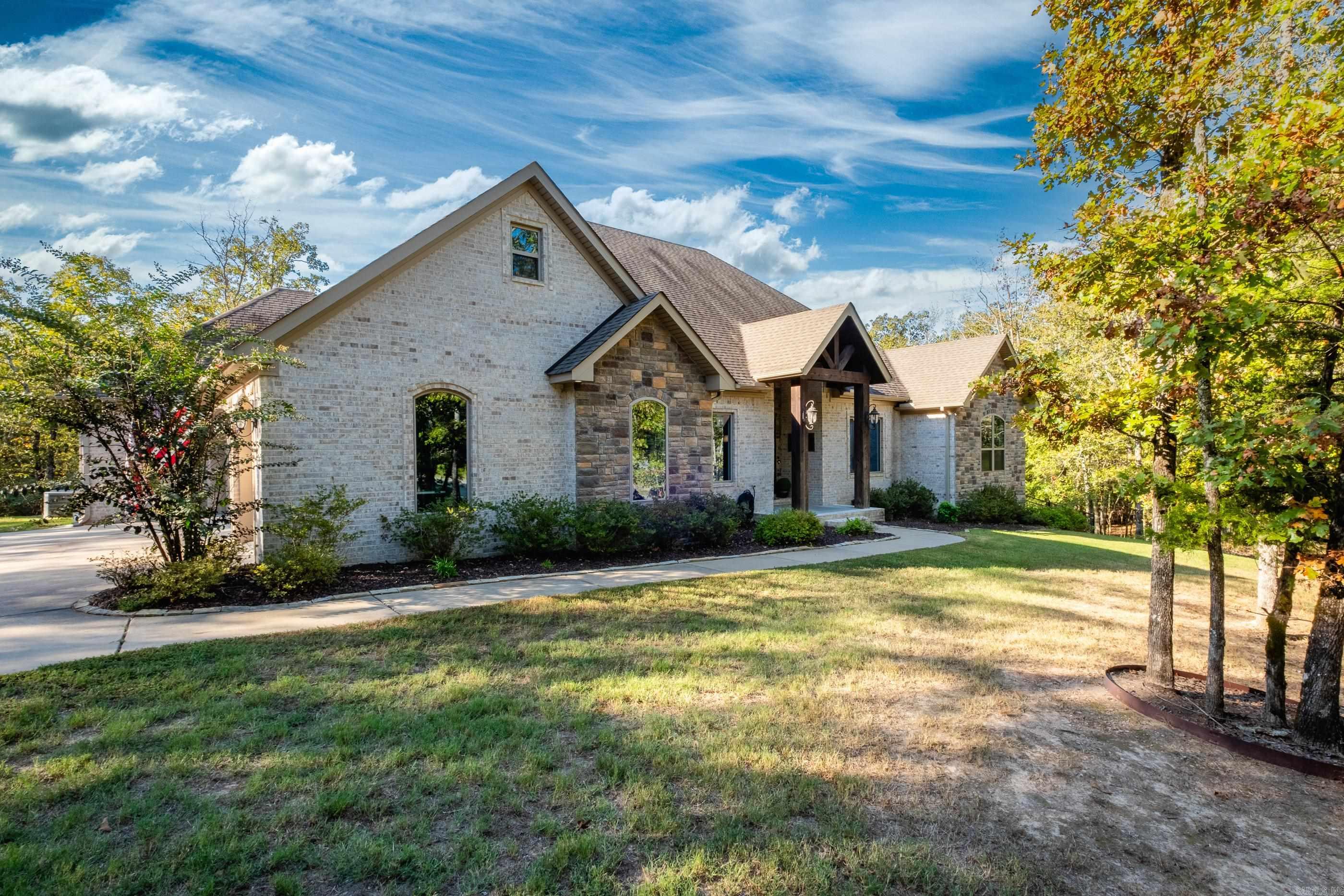 Welcome to your private oasis in the gated neighborhood of Westcliffe! This stunning one-level home sits on over 3 acres of serene land, offering the perfect blend of comfort and adventure. Step inside to discover an oversized living area, ideal for entertaining, with plenty of open space. A large office offers a quiet place to work from home or get creative. One of the 5 bedrooms is currently set up as a home gym, ready to help you stay active. The spacious primary suite is a true retreat, complete with a walk-in closet and an attached laundry room for ultimate convenience. Outside, enjoy the amazing outdoor living area featuring a large covered space with a fireplace that is perfect for relaxing. You can also enjoy the hot tub and a cozy fire pit for evening gatherings. Explore the property further to find a trail leading to a second fire pit next to a charming treehouseāan ideal spot for kids or a peaceful escape. This home offers country living at its finest with all the modern comforts you need. Donāt miss your chance to make it yours!