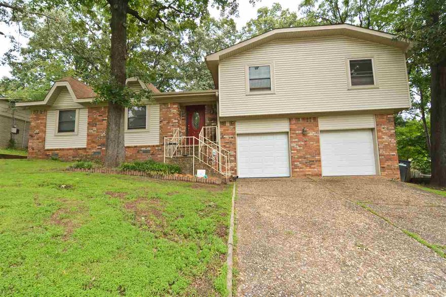 Looking for a great home, for a great price! this is it.  This 3 bedroom 2 bath has 2 living areas with lots of updates which include Roof, Heat/Air, Windows, Siding and flooring. Laminate flooring in living areas with tile in kitchen and baths. New carpet in bedrooms. Needing to entertain? this backyard is calling your name! Other features include a 2 car garage with a storage, and a clubhouse for the kids!!! Call Now, lets see this one today.