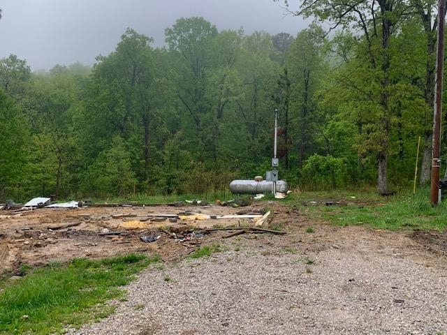 Close to 30 acres with no restrictions. Build a forever home or a getaway cabin or two. Property is on both sides of the road. There are two small ponds and several building spots available. One spot already has power, water, septic as well as a propane tank. This property is secluded with a seasonal creek. Only 30 minutes to Mountain View, the Folk Music Capital of the world. The property is only about a half a mile down a well maintained county road. There is lots of wildlife in this area which would also make it great for hunting. Don't miss out! Call me today to view this little piece of paradise!