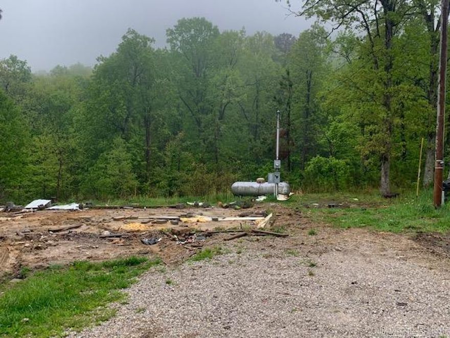 23 acres ml with no restrictions. Build a forever home or a getaway cabin or two. P There is a small pond and several building spots available. One spot already has power, water, septic as well as a propane tank. This property is secluded with a seasonal creek. Only 30 minutes to Mountain View, the Folk Music Capital of the world. The property is only about a half a mile down a well maintained county road. There is lots of wildlife in this area which would also make it great for hunting. Don't miss out! Call me today to view this little piece of paradise!