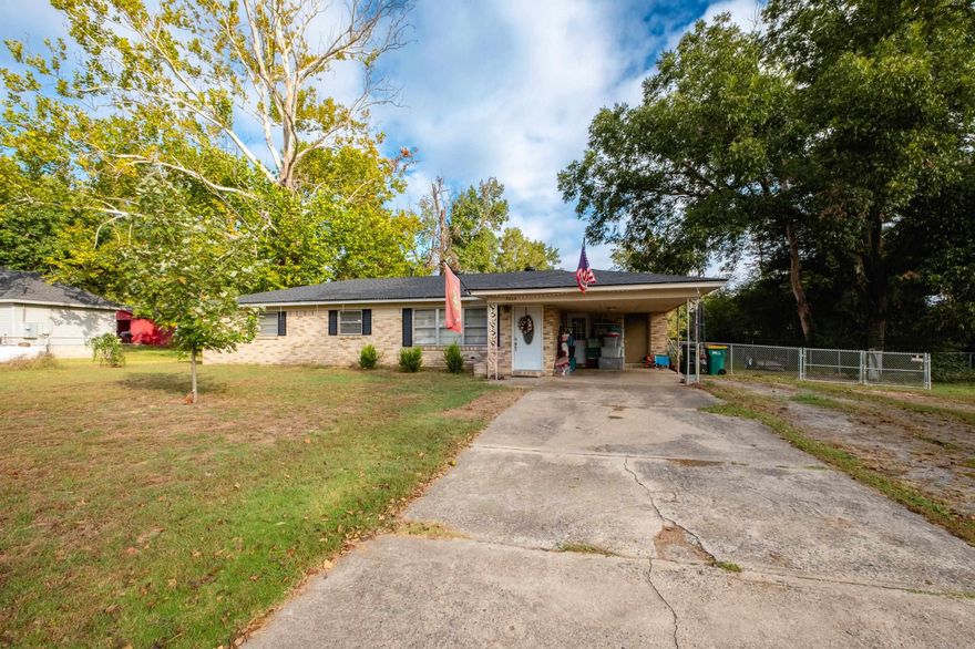 Come see this spacious home on a Full 1.0 Acre Lot! Tons of updates including Roof (2023), HVAC (2022), Tankless Water Heater (2024), Stove, Dishwasher, Fridge, Electrical Panel plus a whole home rewire, Primary bathroom remodel, Covered Patio and recently installed fence with 2 double gates and a single gate. This single level home offers two living areas, one formal at the front of the house and the other at the back of the house that boasts vaulted ceiling with wood beams and a brick site-built fireplace. The area off of the second living area is currently being used as a bedroom. The kitchen offers great storage space, a gas range, and LVP flooring. Relax outside in the backyard on the covered concrete patio and enjoy the spacious level and cleared fully fence in back yard along with a Tuff Shed, ready for storage. The property also extends past the fence. Survey on file. Come see it today! Agents see remarks.