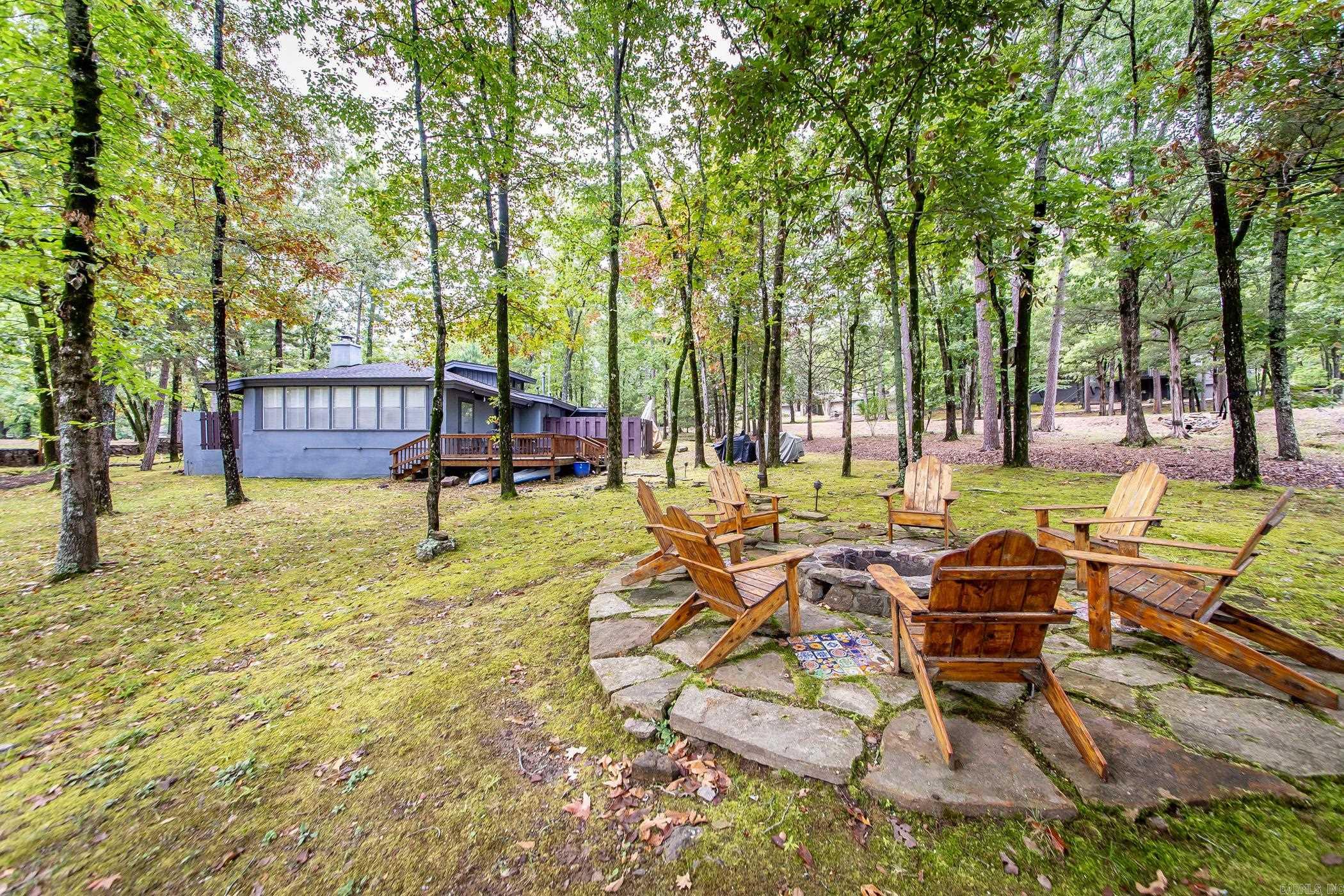 One of the original Cottages first built on Eden Isle! Home has beautiful private front entrance and could come furnished. Vaulted ceilings, exposed beams, 2 full baths, 2 bedrooms, Bunk room which could be a 3rd bedroom, gas fireplace, & fully equipped kitchen. Great winter views of the lake from the back deck, common path to the lake and a short golf cart ride away from the marina! Call today, this one won't last!