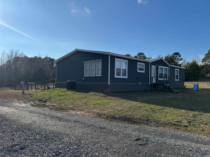 Very Nice secluded home in the country with no restrictions sitting on 3.56 acres. Beautiful luxury vinyl floor and 6 inch walls. Spacious kitchen with lots of cabinets, stainless appliances and an island. Roomy living room with an electric fire place. Nice size master with walk in closet, soaking tub & walk in shower. Laundry room has a sink and door going out to the fenced back yard. Lots of privacy with plenty of room to build a shop or have a horse or what ever you want. 12x20 storage building for all your yard equipment. If your looking for a place with 3 acres or more and a nice home give us a call.