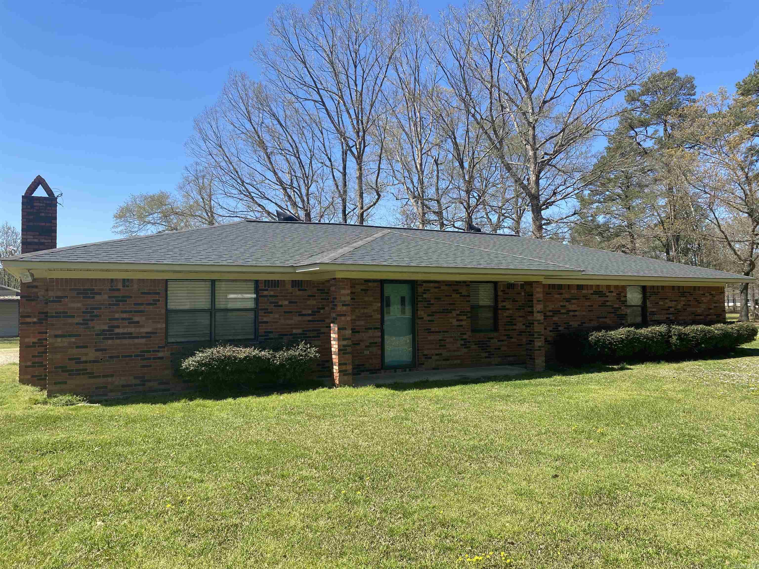 3 bed / 2 bath / 2,009 sqft ranch-style home on 2.04 acres located in the Milo community. 20x30 shop with three lean-tos and half-bath. 16x16 storage building. Interior features include open kitchen, dining, living. Living room has full-length brick hearth and plumbed for wood stove or fireplace. Kitchen is spacious with breakfast bar, ample cabinetry, dishwasher, gas (propane) cooktop, wall oven, microwave and refrigerator. Spacious laundry room located off kitchen has room for freezers and shelving for organized storage. All bedrooms are nice sized. Hall bath has shower/tub combo. Primary bedroom features French doors, walk-in closet, built-in office desk/craft table with attached bath having walk-in shower. Propane heaters located in living room and bath. Copy of survey in file. Electric hot water heater (2023), Architectural shingle roof (2018), Electric Central HVAC (2002)