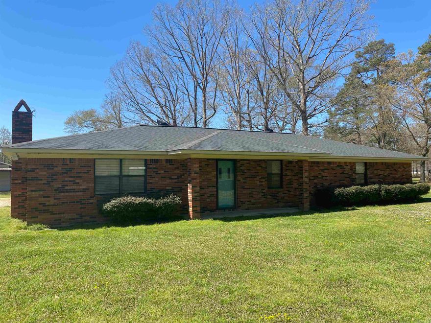 3 bed / 2 bath / 2,009 sqft ranch-style home on 2.04 acres located in the Milo community. 20x30 shop with three lean-tos and half-bath. 16x16 storage building. Interior features include open kitchen, dining, living. Living room has full-length brick hearth and plumbed for wood stove or fireplace. Kitchen is spacious with breakfast bar, ample cabinetry, dishwasher, gas (propane) cooktop, wall oven, microwave and refrigerator. Spacious laundry room located off kitchen has room for freezers and shelving for organized storage. All bedrooms are nice sized. Hall bath has shower/tub combo. Primary bedroom features French doors, walk-in closet, built-in office desk/craft table with attached bath having walk-in shower.  Propane heaters located in living room and bath. Copy of survey in file.  Electric hot water heater (2023), Architectural shingle roof (2018), Electric Central HVAC (2002)