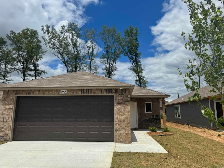 Come check out this lovely Ridgeland plan! This pretty home has a modern look and sleek brick detailing in the front. The offset front door creates an entry that is perfect for removing wet shoes and placing dripping umbrellas. The front hallway welcomes you past Bedrooms 2, 3 & 4 and into an open concept Kitchen and Living Room. The Master Suite is set to the rear of the home for added privacy, and has a generously sized Master Closet.   Thoughtful upgrades in this home: soaker tub/shower in Master Bath, plumbing faucet upgrade 2, 8" deep Kitchen sink, door bell, added cable jack, HVAC rigid duct upgrade, laminate flush bar top in Kitchen, Luxury Vinyl Plank flooring in wet areas and Living Room and adjacent hallways, raised ceilings in Living Areas per municipal requirements, Cheyenne style doors, baseboards level 2, 25in. wide attic stairs, LED disk lights in Kitchen, full sod, stainless steel appliance package.   *** AGENTS, PLEASE SEE AGENT REMARKS OR SHOWING REMARKS. ***  THIS HOME IS SCHEDULED TO BE COMPLETE IN EARLY MAY.