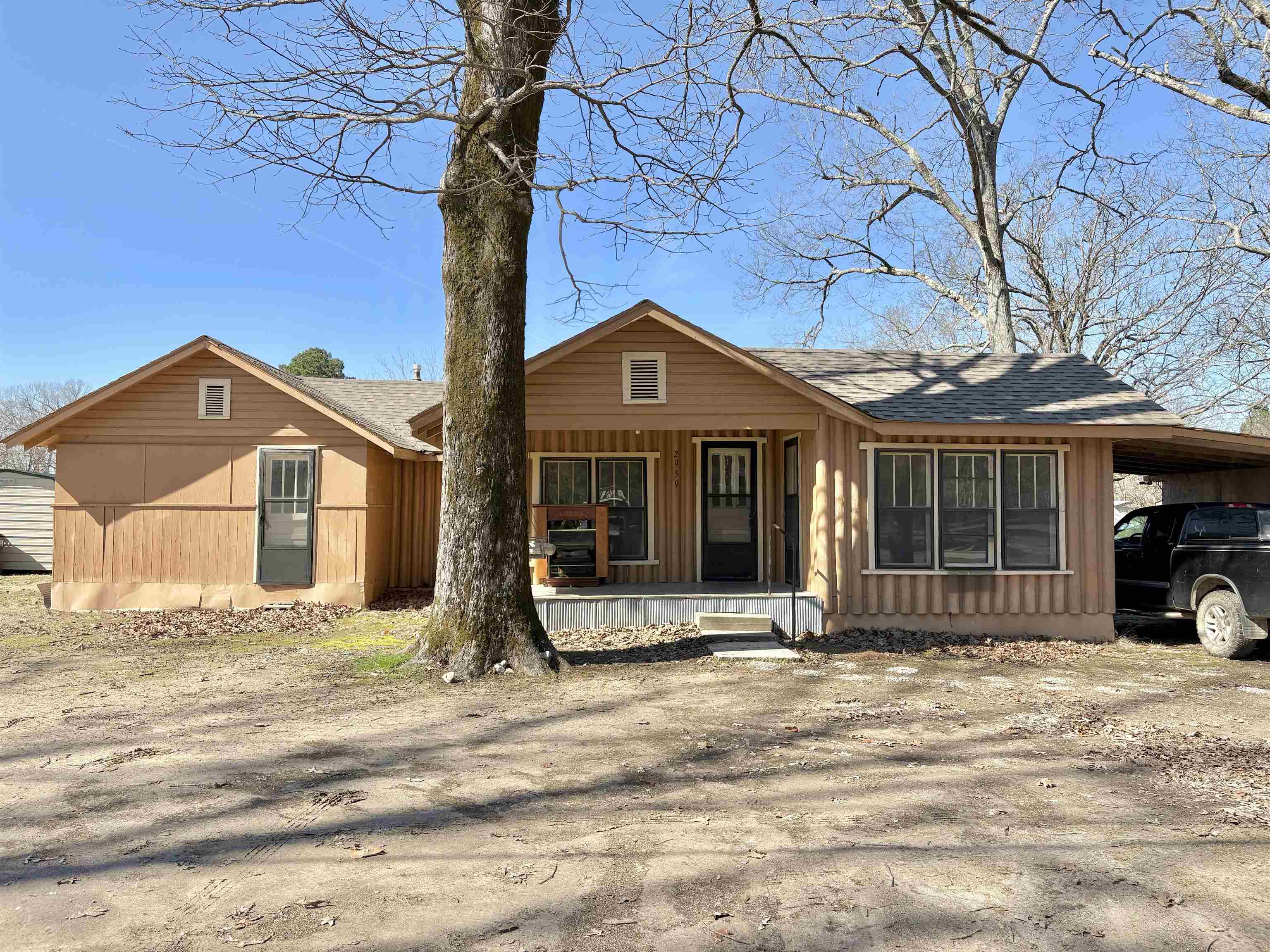 Cute historical home on close to an acre of land. Located just one mile south of town, this home has a newer roof & septic that was done in 2022. Gas stove and gas wall furnace. Spacious kitchen and separate laundry room. This would be a nice rental or first home. There is extra insulation in the ceiling and the home was releveled 3 years ago. This home is on the historical record & ready for its new owner!