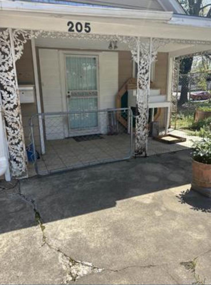 Don't miss this one! a 3/2 house hardwood floors two living areas. The basement opens up to a business space with 37 ft frontage on Central Ave. Perfect for a small business just minutes from Oaklawn! Call today to see!