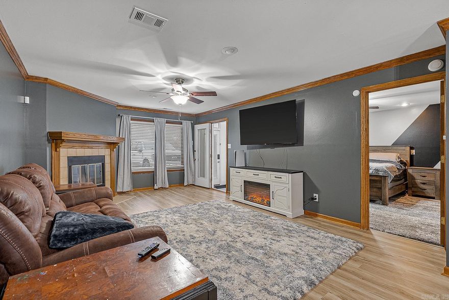 Take a look at this gorgeous 2 bedroom 2 bathroom condo located in the heart of downtown, Jonesboro. This beauty features 1000 Square feet of open-concept living space, new flooring, fresh paint, fireplace, appliances, a private patio & so much more!  The patio leads right out to the in-ground pool area.  Located on the ground level, this condo has convenient access to all the property amenities. The well manicured courtyard is the perfect spot, for reading, studying or relaxing. Whether you are looking for an investment property or a move in ready place to call home, this is the one! Call today to schedule a tour of this property!