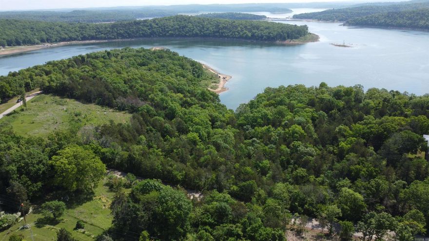 Two lots equaling about 1.39 acres. Year round panoramic views of Lake Norfork. New modern homes being built all around. Close to Pigeon Creek Park. Property borders Army Corps of Engineers on east side.  Seller will sell the lots individually for $59,000 each.