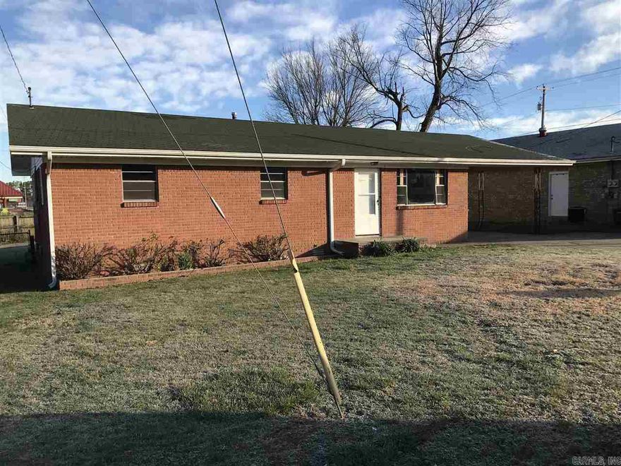 UPDATED combining small master bath with hall bath, fresh paint in two bedrooms and new plank flooring throughout. Conveniently located near shopping, banking and schools. Electric wall oven and cooktop, refrigerator, dishwasher, washer and dryer furnished. Gas central heat, central air. Extra storage off the one-car carport. Partially fenced back yard. Tenant is responsible for all utilities and for lawn care. No pets. Not a HUD Section 8 rental. Application required. Application fee charged.