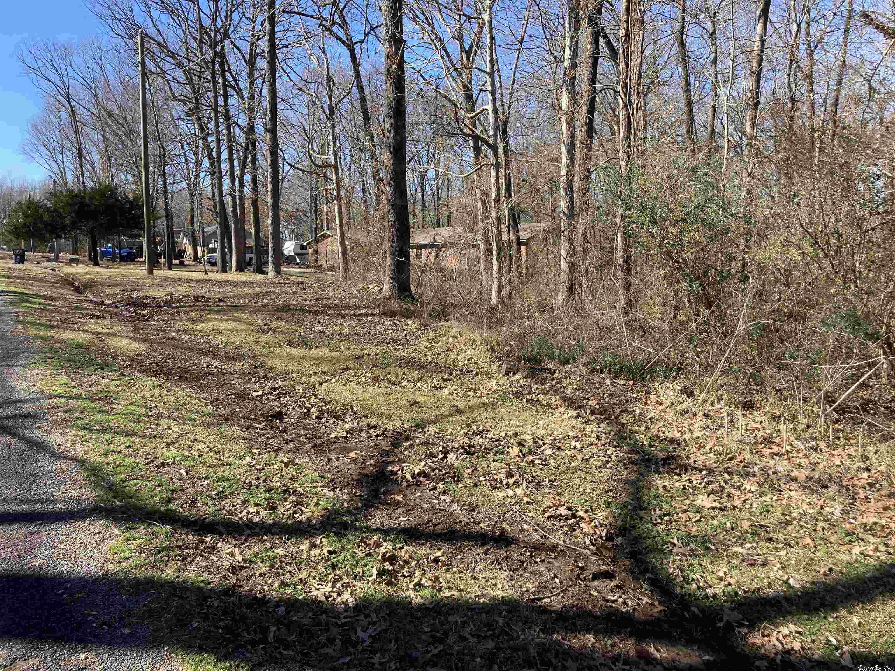 For Sale! Lot 17 in Sweetwater Estates, priced to sell. Has mature hardwoods and is ready to be cleared. Has small wet weather creek running through it. Has city water and electricity at the road. No mobile homes.