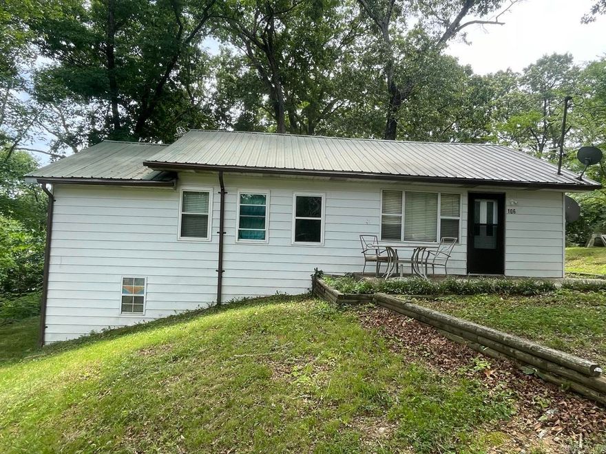 Opportunities like this do not come around often in Hot Springs! Situated on a rare and desirable 3.07-acre lot, this property offers the perfect blend of space, privacy, and incredible development potential. Whether you are looking for a unique primary residence, a short-term rental investment, or a property with room to expand and build, this acreage is a blank canvas.  The home features a spacious 4-bedroom, 1.5-bathroom layout, offering character and solid bones ready for your personal touches or modern updates. Step outside to find the ultimate workspace or storage solution: a massive 30' x 56' detached shop equipped to handle everything from heavy equipment and boat storage to the ultimate hobbyist’s workshop.  Located just minutes from the lakes, historic downtown, and local attractions. Land is a finite resource in Hot Springs—don't miss your chance to own a piece of it with room to grow! Schedule your showing today. Agents see remarks.