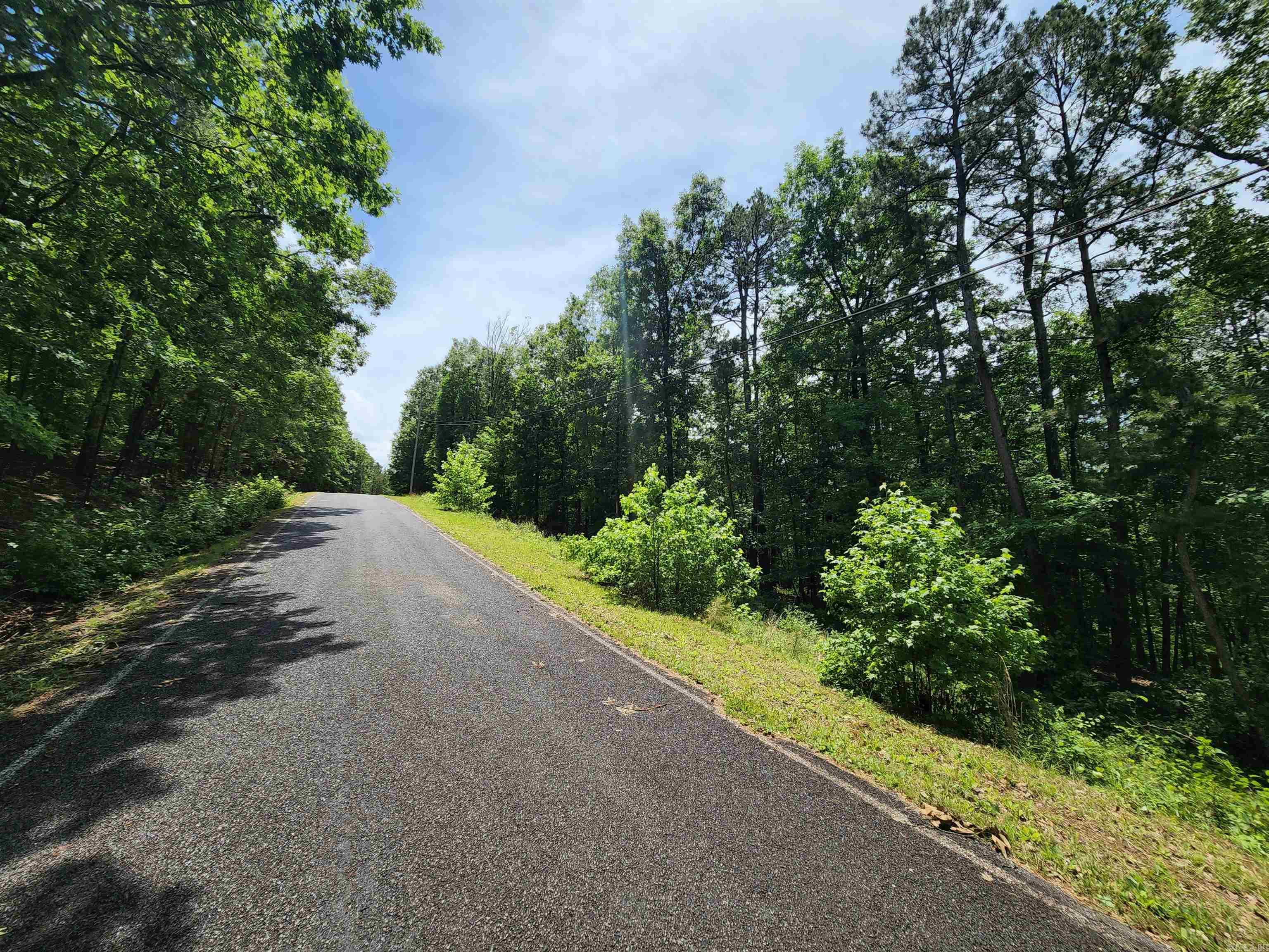 Great Lot to build your resort home on or weekend getaway, get access to the 100 miles of trails, 3 pools and so much more by being a lot owner & member of Fairfield Bay Resort Community!