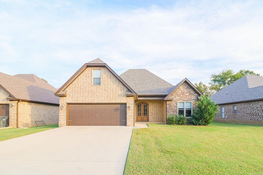 Welcome home to this beautiful 3-bedroom, 2-bath residence with a large bonus room located in the desirable Cypress Pointe Addition in the Hilltop area of Jonesboro! Offering approximately 2,100 sq. ft. (more or less) of heated and cooled living space per county records, this move-in-ready home combines comfort and style throughout.  You’ll love the spacious open layout, vaulted ceilings, and rich wood finish flooring that flow through the main living area. A stunning stone fireplace creates a cozy focal point, while the screened-in back porch provides the perfect spot to relax or entertain year-round. The kitchen features granite countertops, ample cabinetry, and modern finishes. The primary suite includes a custom tile shower, double vanity, and generous closet space.  With its brick and stone exterior, well-maintained condition, and prime Hilltop location, this home offers the best of both beauty and convenience. Schedule your private showing today!
