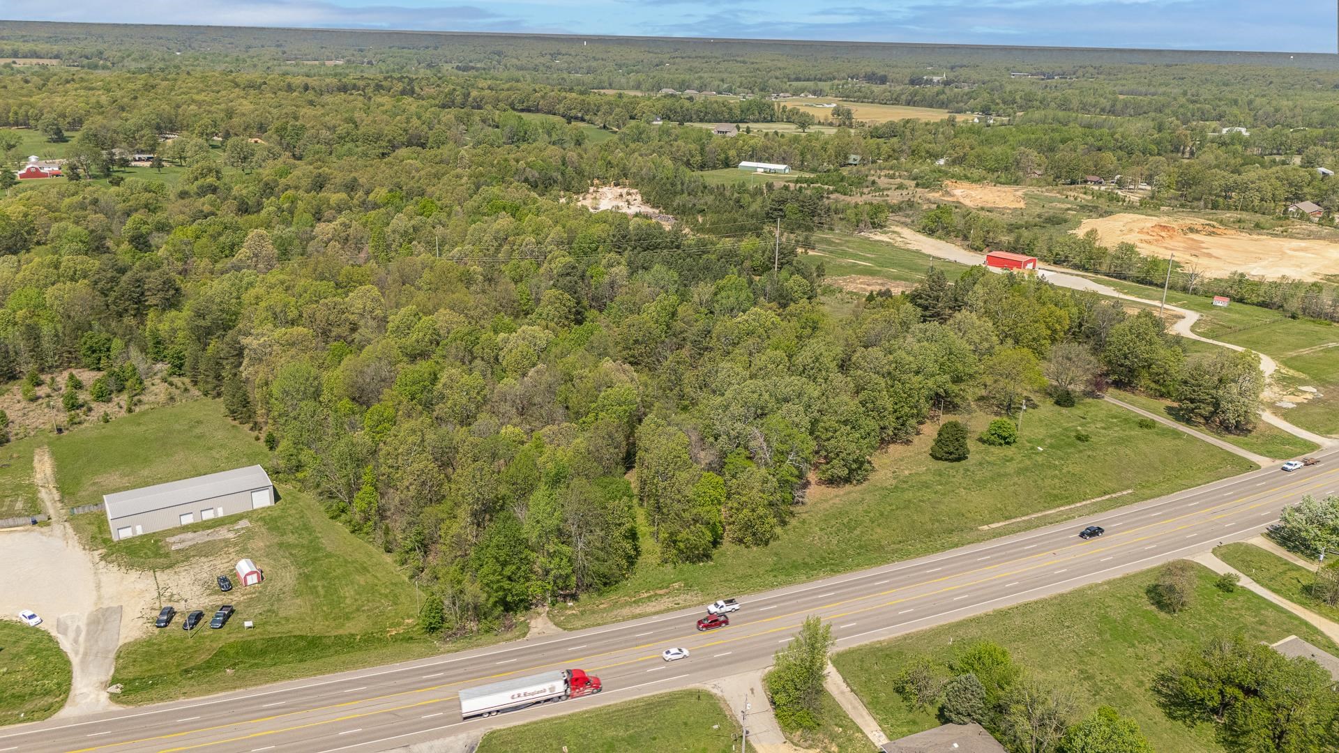 Wooded land for sale on Hwy 49 South, seller will provide a deeded easement to the 14 plus acres available on this hill ground with mature trees. Surveyor will determine legal description and road access. County property not in city limits, this was an old homeplace and now just vacant land, splitting larger parcel to 14 acres approximately. All measurements will be verified by survey when property is under contract