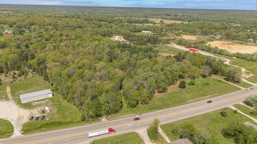 Wooded land for sale on Hwy 49 South, seller will provide a deeded easement to the 14 plus acres available on this hill ground with mature trees. Surveyor will determine legal description and road access. County property not in city limits, this was an old homeplace and now just vacant land, splitting larger parcel to 14 acres approximately. All measurements will be verified by survey when property is under contract
