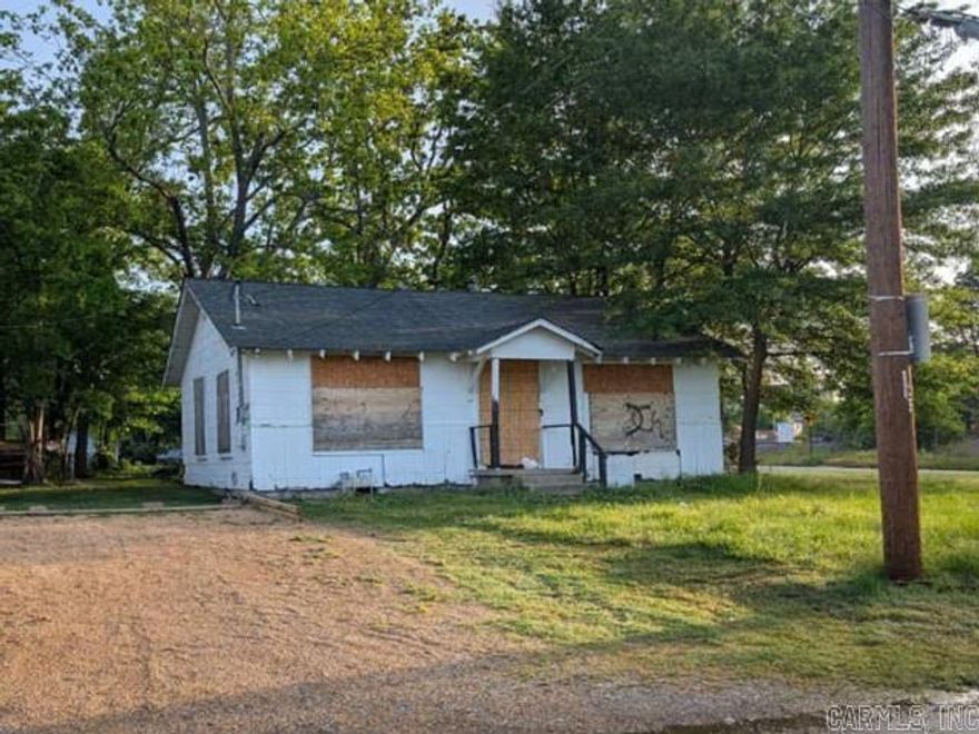 Take a look at this investment property. Two bedroom, one bathroom. Boarded with no access due to condition. Check with local authority for repair/development  options.  RESERVE AUCTION –Property is boarded with no access. NO VIEWINGS. "As is" sale with no contingencies or inspections.  Cash only due to lack of access to  interior.