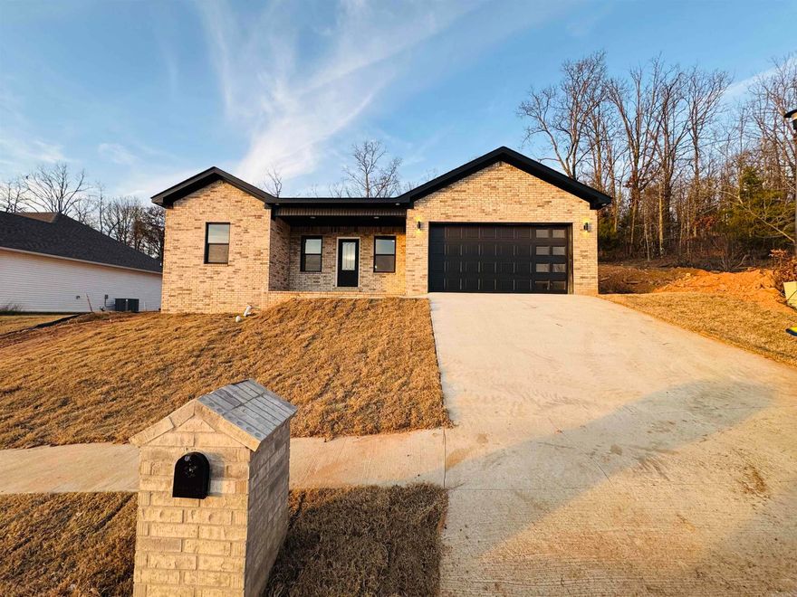 Check out this new construction sitting in the sought after Pleasant Forest Subdivision!  This ALL brick, 4 bed 2 bath is ready for someone to call home!  Location wise, this is less than a mile from several restaurants and shopping, yet  tucked away in a quiet area and is the last house on the street to give extra privacy.  Featuring an oversized front porch and a nice sized living area that opens up to the kitchen for a perfect setting to entertain.  Master is set apart with 10 foot ceilings throughout and has custom cabinetry and granite in kitchen and baths to top it off.  Beautiful tile and LVP has been installed for easy maintenance and lasting beauty.  Perched on the hill giving a nice view of the sunset and minimal yard to maintain. Why buy used when you can own NEW with a warranty!  Call your realtor and book your showing because this one is priced to sell!