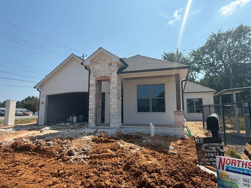This exquisite new construction home boasts 3 bedrooms & 2 baths, featuring an expansive open concept layout & a sought-after split floor plan. The lavish living room offers ample space for entertainment & relaxation that adds a touch of elegance to every gathering. Retreat to the spacious primary suite, where you’ll discover a haven enhanced by an oversized walk-in tile shower & luxurious double vanities for added convenience. The gourmet kitchen is a culinary masterpiece, showcasing stunning quartz countertops & under cabinet lighting that illuminates the space with style. Throughout the home, you’ll be captivated by the allure of  LVP flooring, designer light fixtures, & generously proportioned spare bedrooms. Step outside to the covered porch & immerse yourself in the tranquility of the surroundings. Prepare to be amazed by this must-see home that epitomizes modern living.