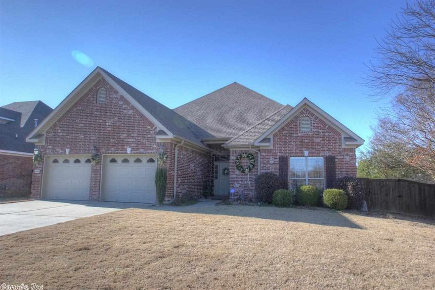 Beautiful, quality built home located in a very quiet cove in Southwind Subdivision with 3 full baths, 4 bedrooms & a very open, split floor plan. The Foyer greets you with pristine hardwood floors & faux painted walls. You will love the open den with lots of windows & fireplace.  Kitchen has custom built cabinets and is very open to the great room with a bar that will be great for the kids to gather round. Other features include oversized bedrooms, deep crown moldings, separate laundry and covered patio.