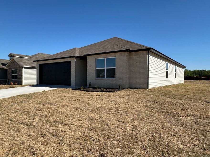 The Magnolia plan is a beauty. Bedroom 4 is set to the front of the home which makes it perfect for use as a craft room, bedroom, office and more. Come tour it today.   Valuable upgrades included: 60" fiberglass standup shower (no enclosure) in Master Bath, plumbing faucet upgrade 2, 8" deep Kitchen sink, crown on Kitchen cabinets, flush laminate bar top, Luxury Vinyl Plank flooring in wet areas and Living Room and adjacent hallways, garage door opener level 1, raised ceilings in Living Areas per municipal requirements, fiberglass exterior doors, Cheyenne style doors, baseboards level 2, 25in wide attic stairs, LED disk lights in Kitchen, LED light over Master Shower, exterior ceiling fan in Back Patio, full sod, stainless steel appliance package.    ***AGENTS: PLEASE SEE AGENT REMARKS AND/OR SHOWING REMARKS FOR VERY IMPORTANT INFORMATION.***  THIS HOME IS SCHEDULED TO BE COMPLETE IN APRIL 2025.   PLEASE NOTE: The mailing address for this property is Cabot. The city that governs this neighborhood is Ward. The community is located in the Cabot School District.