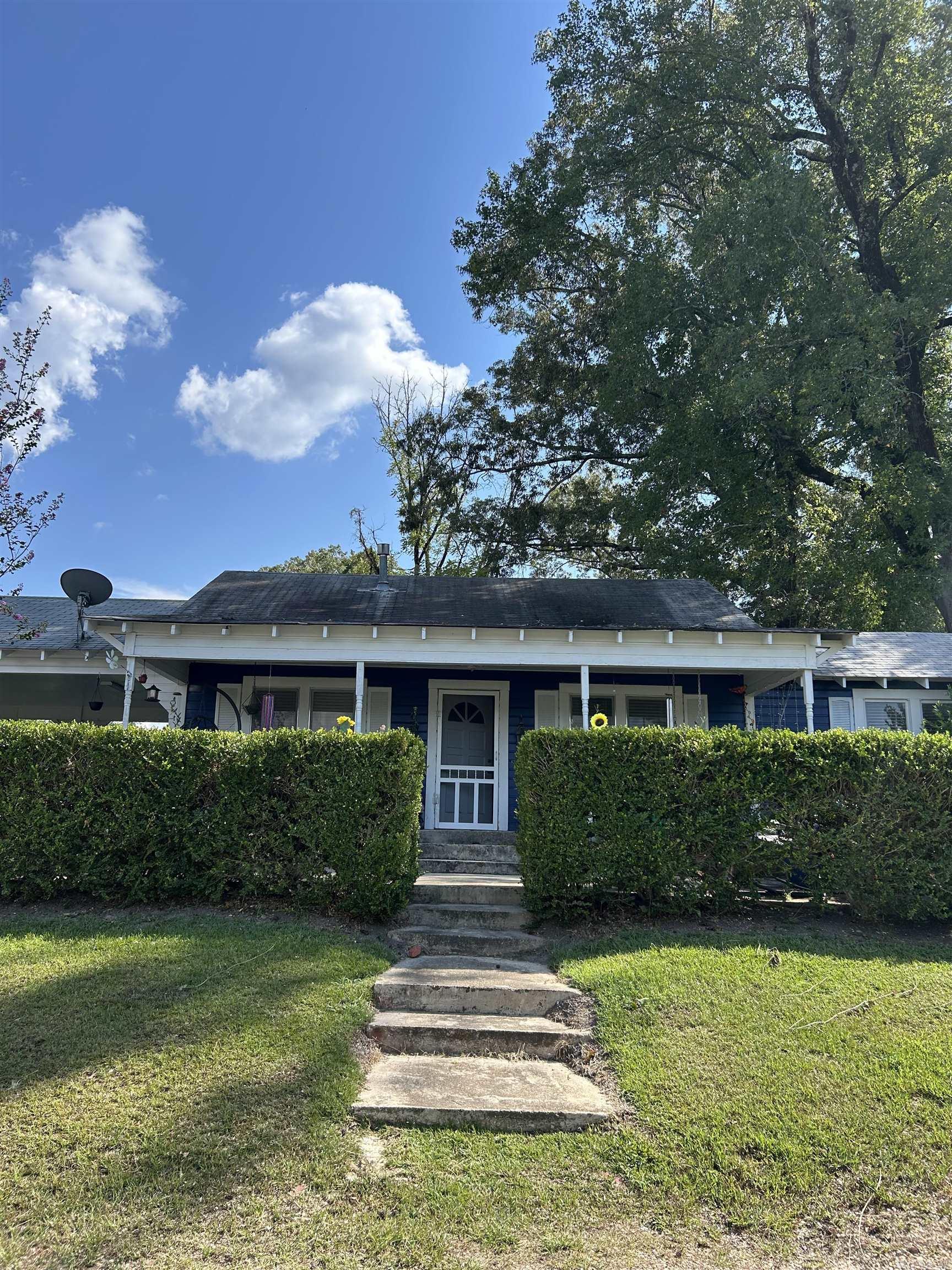 Investment opportunity in a prime location! This property offers endless potential for both investors and entrepreneurs. Situated on nearly 2 acres, it includes a 2 bedroom, 1 bath home recently remodeled and currently rented, along with three mobile home lots generating rental income. The home features a large fenced in backyard. Beyond the existing income streams, the land itself is a valuable asset. Its prime location makes it ideal not only for continued residential rentals but also as a future site for a business or new development. Whether you are looking to start your portfolio, expand your holdings, or explore commercial potential, this property is full of opportunity!