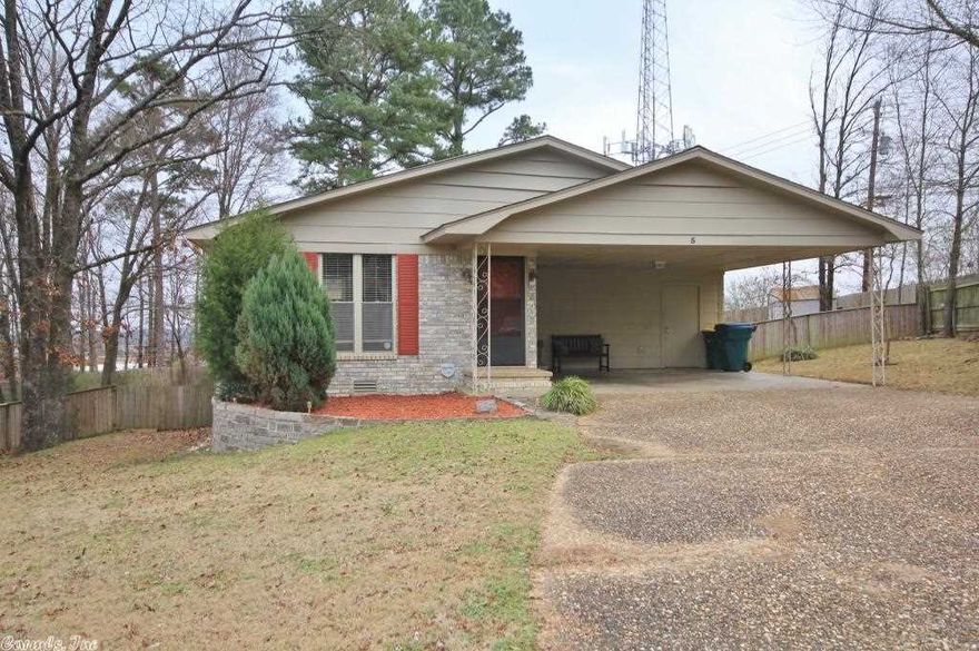 Move right in to this updated charmer! Granite countertops, bamboo flooring throughout main living areas and tile in wet areas and updated lighting. New roof 2012. Modern feeling and décor.  Located on a cul-de-sac with a pretty back yard with storage building included.  Meticulously maintained. Updated bathrooms with neutral décor.  Two car covered parking. Nice neighbors.  Good floor plan and plenty of space in bedrooms, kitchen and living area. Close to shopping, restaurants and interstate access.