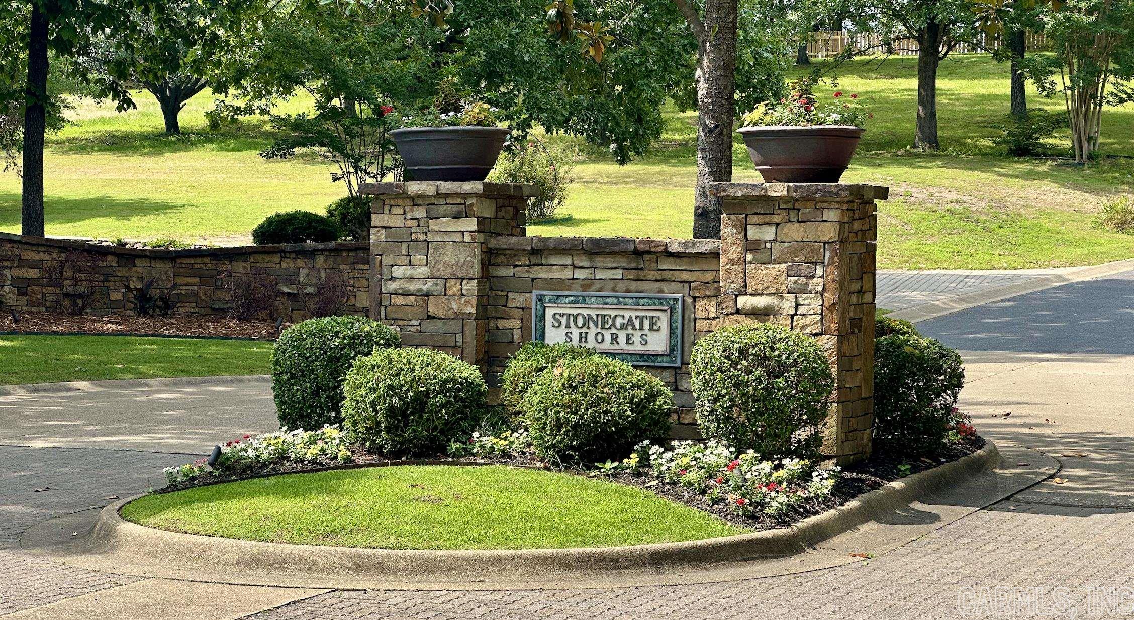 Welcome to your dream opportunity in the prestigious gated community of Stonegate Shores. Nestled in a tranquil and secure neighborhood, this lot presents an extraordinary canvas to build the home of your dreams. Spanning 17,056 square feet, this expansive lot provides ample space to create a custom-designed residence that perfectly suits your unique vision and preferences. The rolling topography of the lot opens up a world of possibilities for creative landscaping, allowing you to craft your own private oasis within this gated paradise. This exceptional gated community offers a wealth of amenities and an unparalleled sense of community. Whether you're taking a refreshing dip in the community pool, engaging in friendly matches on the tennis courts, this community also provides access to a private boat ramp as well as being located in one the states best school districts.