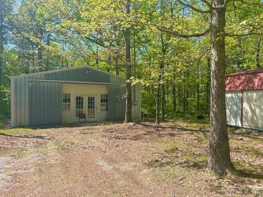 Welcome to the market this 2 bedroom 1 bath Cottage on nearly 5 acres. A Hidden Gem. Tucked away behind what appears to be a shop front, this unique cottage offers cozy living with room to roam. Set on 4.55 acres of private unrestricted land with it's own private driveway. This home features a storage building.  Home is only a short drive to either Mountain View and Heber Springs. Both having lots to offer. Mountain View is known for folk music on the Courthouse Square as well as many other attractions such as The White River, Blanchard Springs Caverns and much more. Heber Springs is know for that Beautiful Red River and Greers Ferry Lake. Many possibilities here. You could live here and build a bigger home or you could rent and use as your very own retreat.  Call today to see this Hidden Gem for yourself.