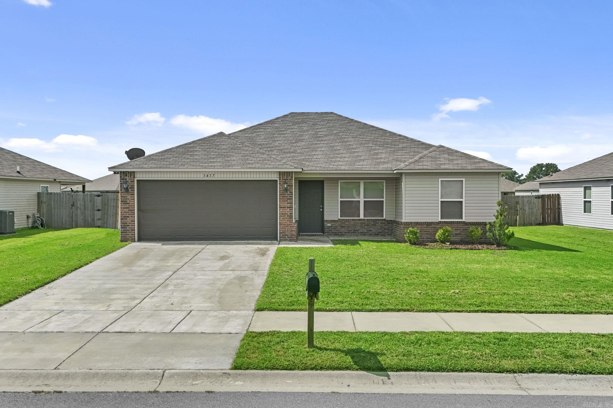 Nestled in the tranquil community of Faulkner Crossing, this delightful 3 BR/2 BA home offers the perfect blend of convenience and comfort. Ideally located just minutes from shopping, golf, and dining between Little Rock and North Little Rock, this home, built in 2019, is an ideal starter home! Inside, you'll find a modern split floor plan, luxury vinyl plank flooring throughout, and a roomy 2-car garage and a fully fenced-in large yard. Don’t miss your chance to call this gem your home—schedule a private showing today!