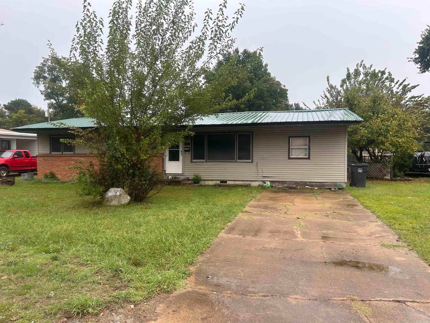 INVESTMENT OPPORTUNITY!! This house is 1,430 square feet 3 bedroom 1 bathroom with a bonus room that could be used as a 4th bedroom, office or extra storage. Couple blocks away from Walnut Ridge School. Being Sold as is Where is.