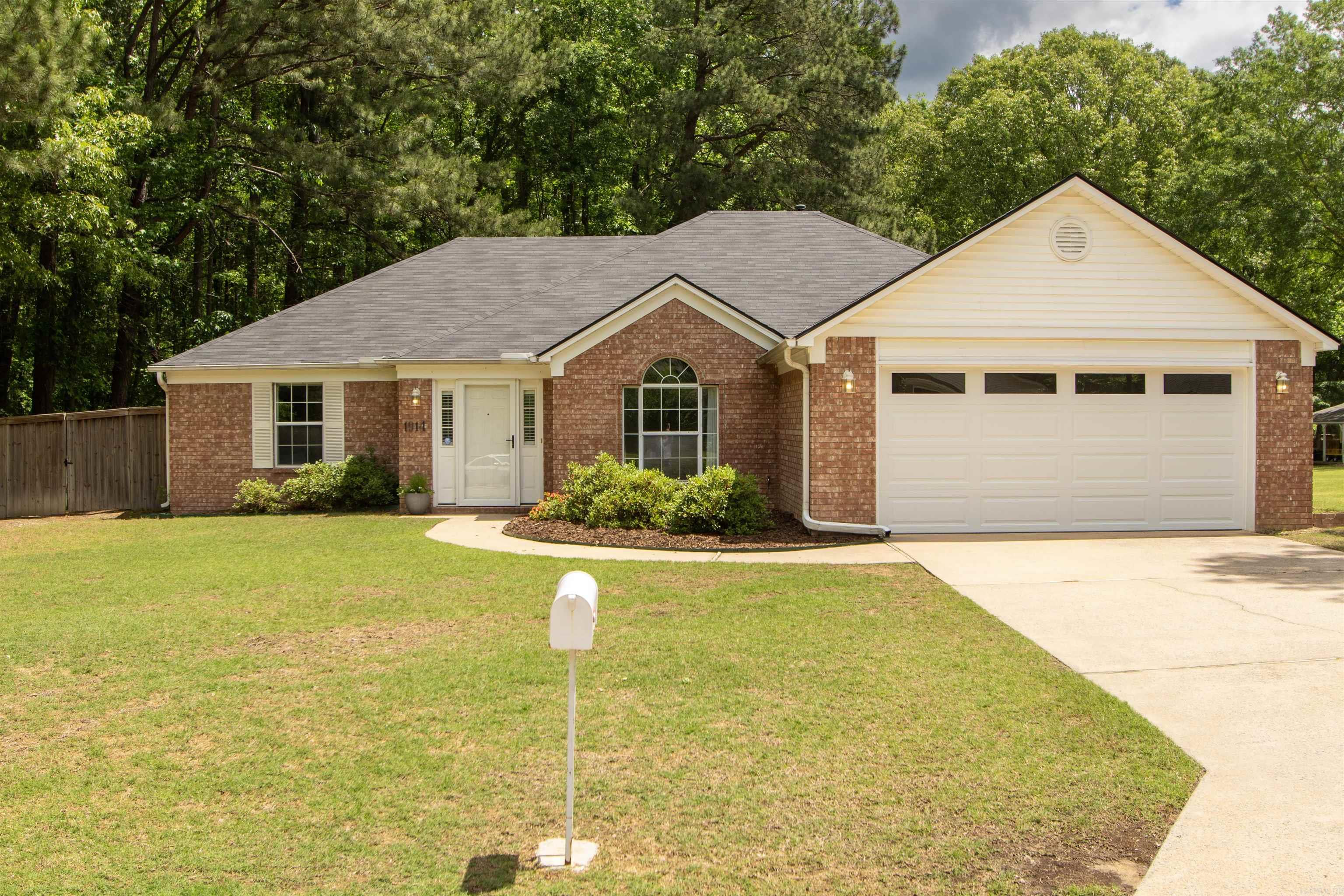 This exquisite three-bedroom, two-bathroom residence is situated on a tranquil cul-de-sac within a serene neighborhood. It features elegant wood flooring throughout and an expansive great room, complemented by spacious bedrooms and a well-equipped kitchen. New roof(2022) New Garage (2024 New carpet (2025