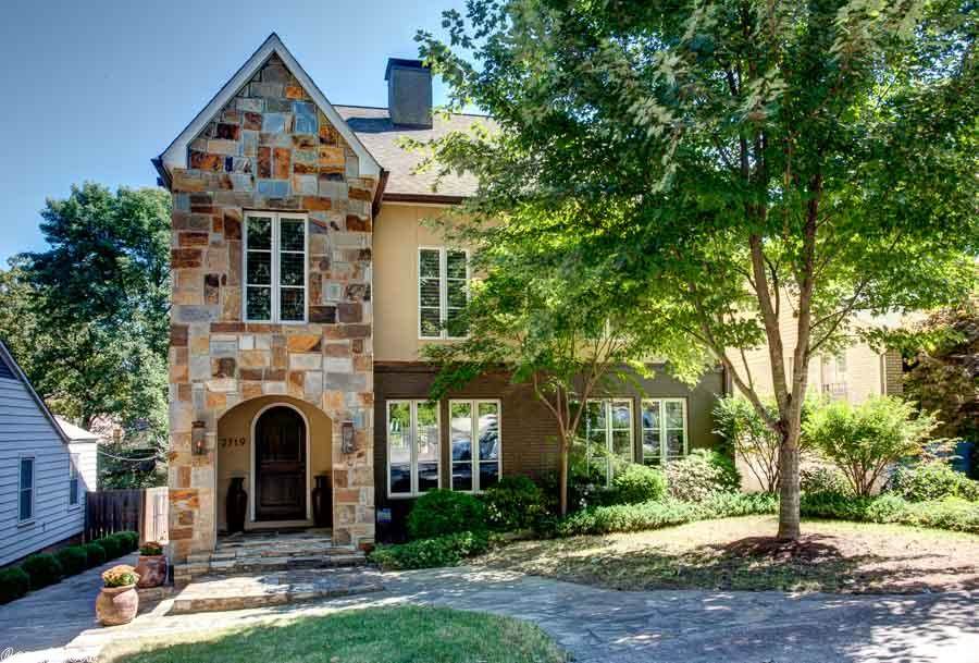 Stunning showplace in the heart of the Heights!  Open floor plan w/ gourmet kitchen, wet bar & built-in coffee bar!  Lots of living spaces + office/ sunroom.  Guest bedrooms on main level include private baths.  Master bedroom suite has fireplace & lrg sitting area.  Elegant, spacious master bath features a double shower, 2 massive closets plus whirlpool tub.  3rd floor loft used as play room plus 4th bdrm. Tons of walk-in storage/ attic space.  Driveway extends to back yd could be expanded for more parking